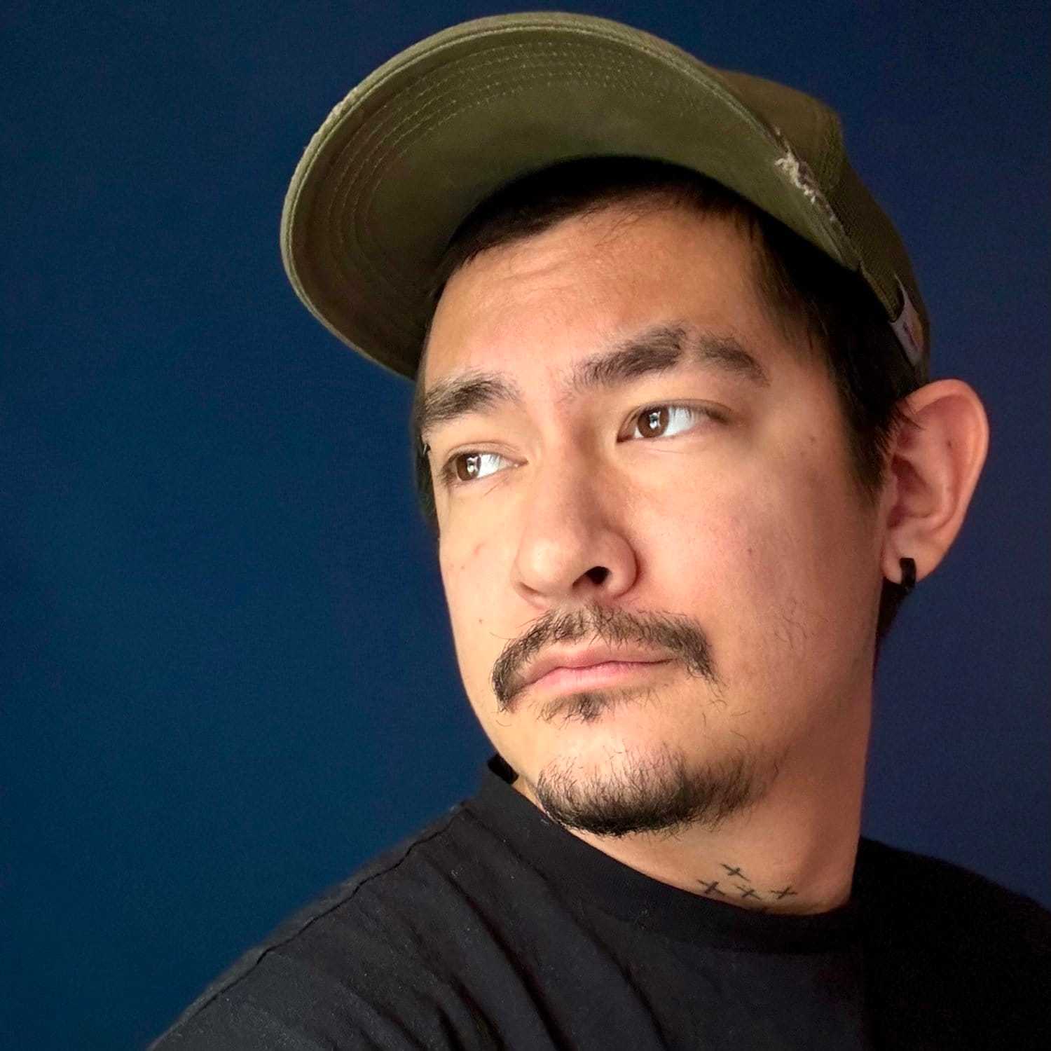 Portrait of SHANE S, a professional stylist at Fringe Salon NY, showcasing their expertise and style.