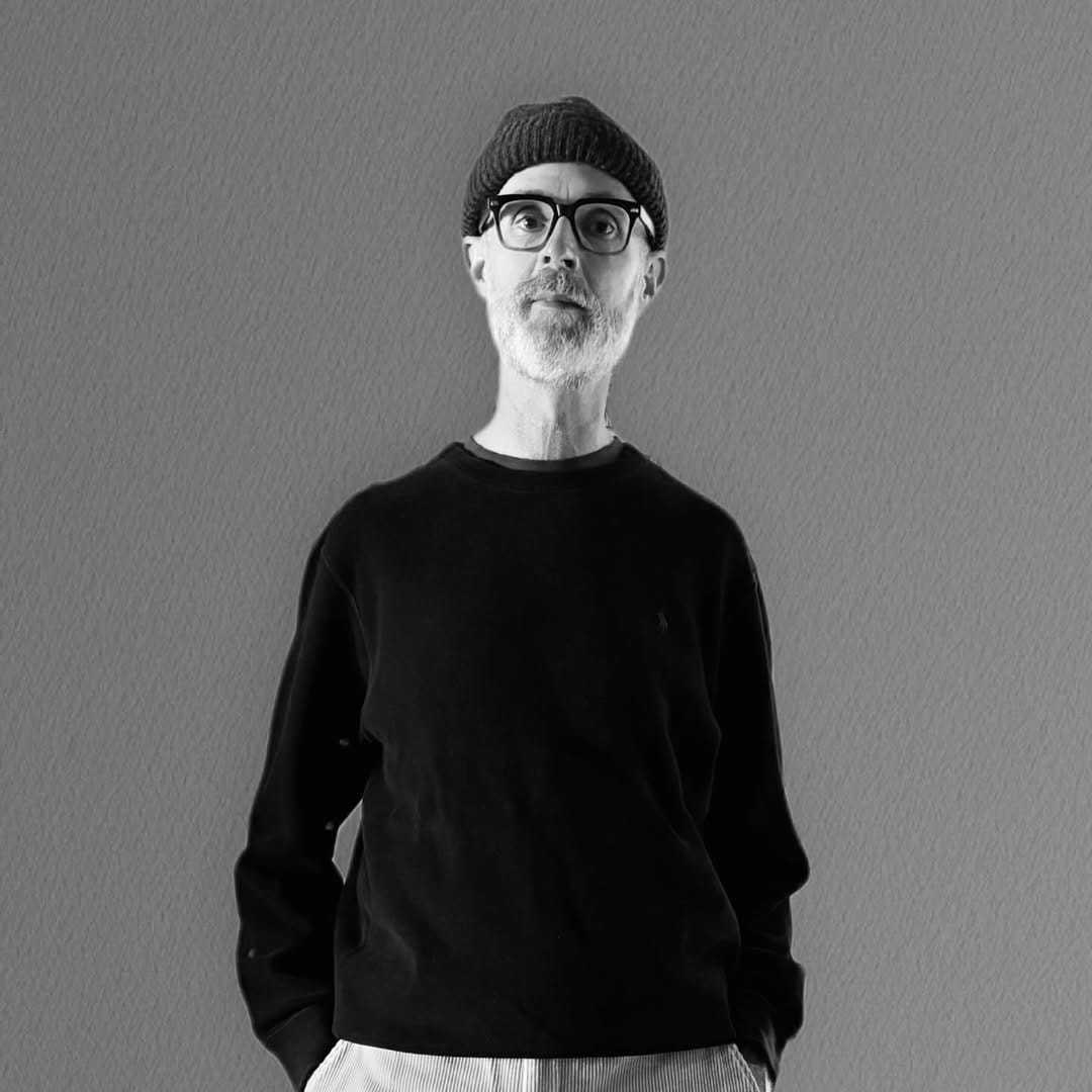 Portrait of KEVIN, a professional stylist at Fringe Salon NY, showcasing their expertise and style.